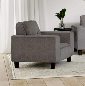 Sillón tapizado Deerhurst con brazos articulados y capitoné, color carbón