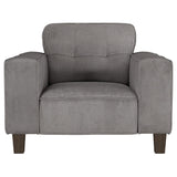 Sillón tapizado Deerhurst con brazos articulados y capitoné, color carbón