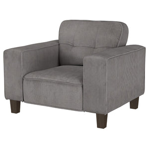 Sillón tapizado Deerhurst con brazos articulados y capitoné, color carbón