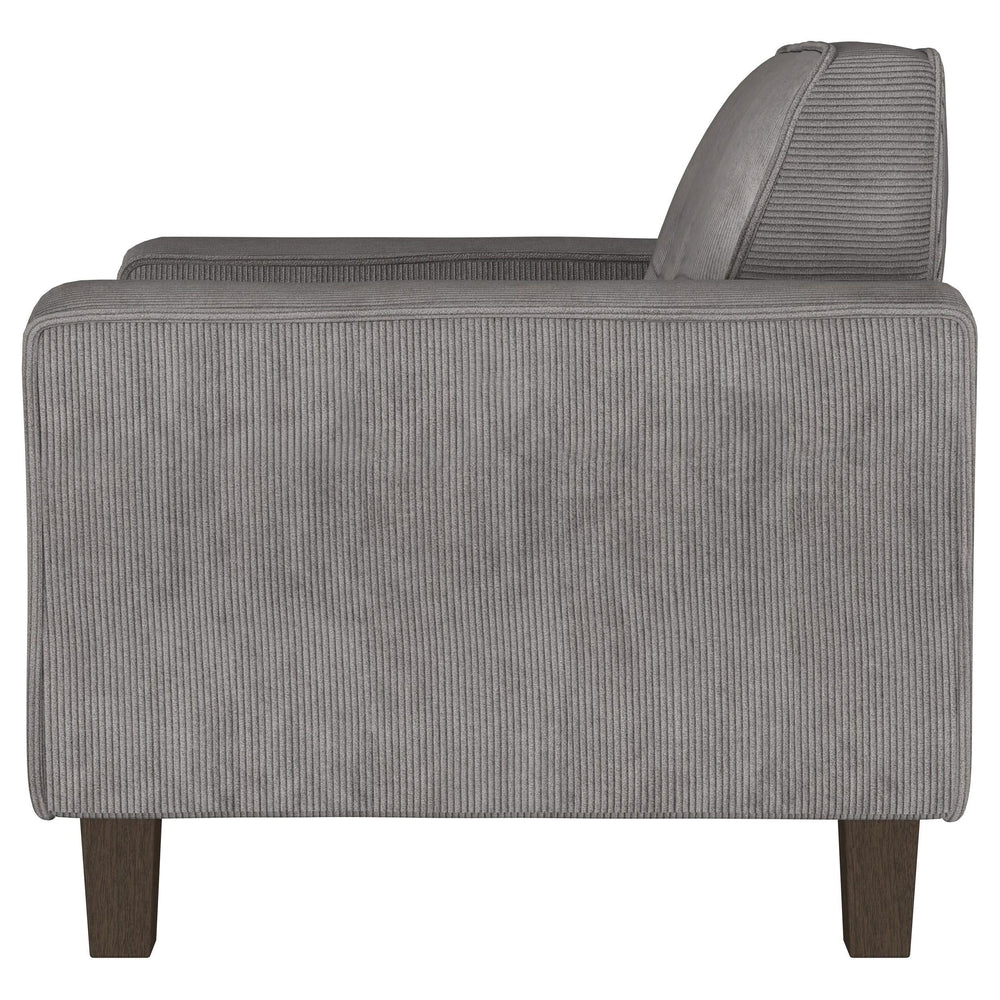 Sillón tapizado Deerhurst con brazos articulados y capitoné, color carbón