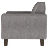 Sillón tapizado Deerhurst con brazos articulados y capitoné, color carbón