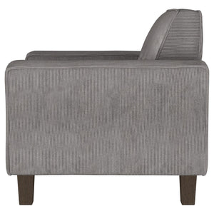 Sillón tapizado Deerhurst con brazos articulados y capitoné, color carbón
