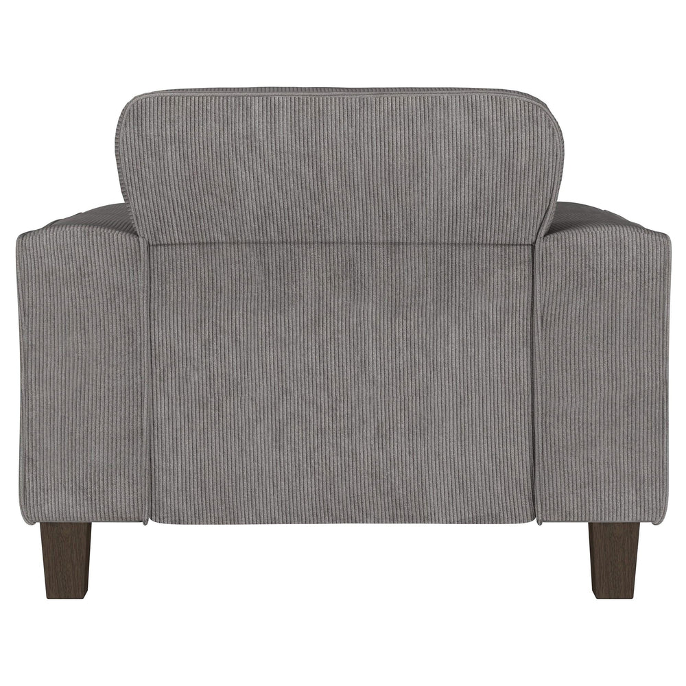 Sillón tapizado Deerhurst con brazos articulados y capitoné, color carbón