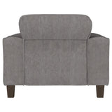 Sillón tapizado Deerhurst con brazos articulados y capitoné, color carbón