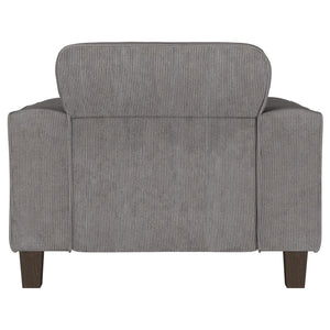 Sillón tapizado Deerhurst con brazos articulados y capitoné, color carbón