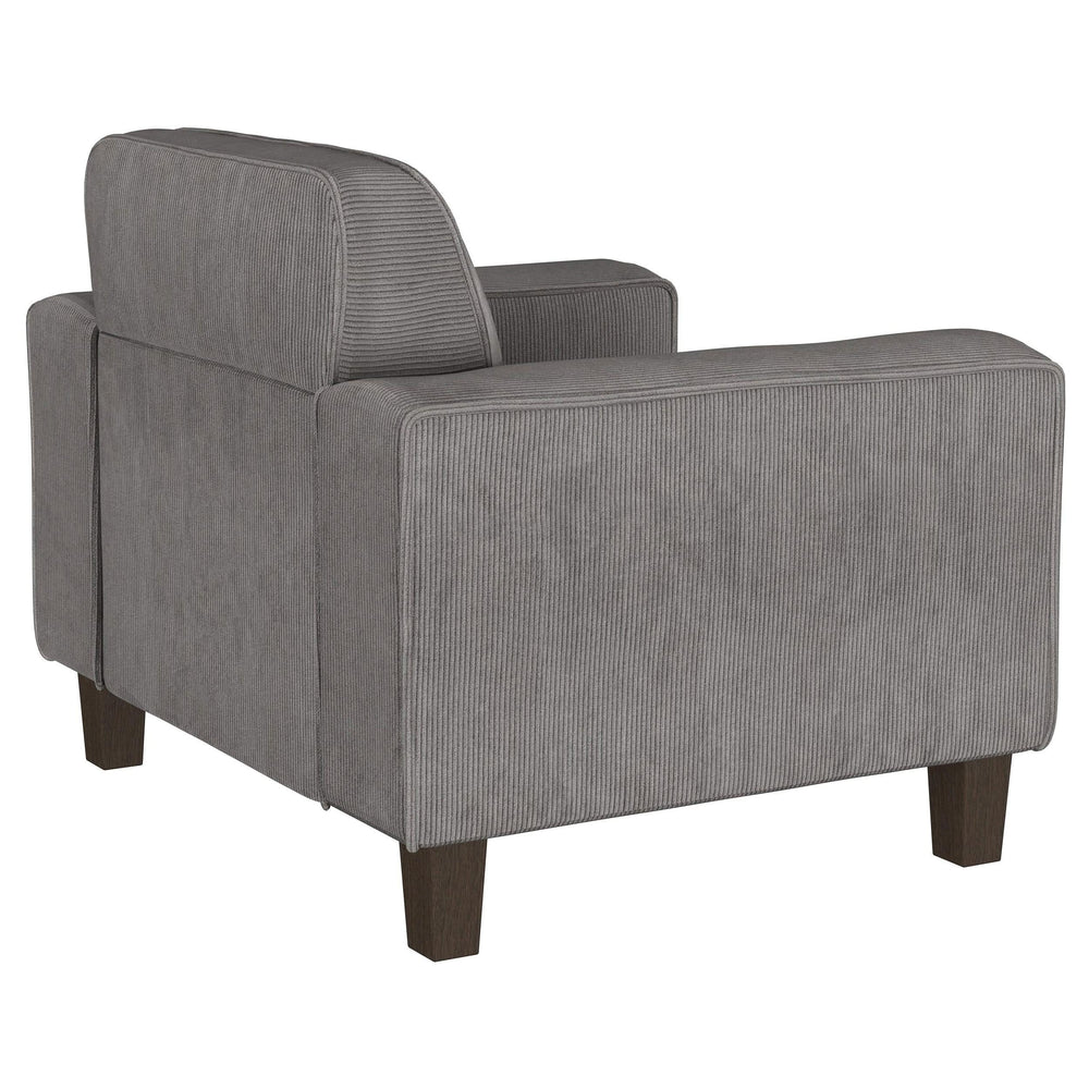 Sillón tapizado Deerhurst con brazos articulados y capitoné, color carbón