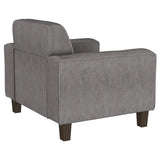 Sillón tapizado Deerhurst con brazos articulados y capitoné, color carbón