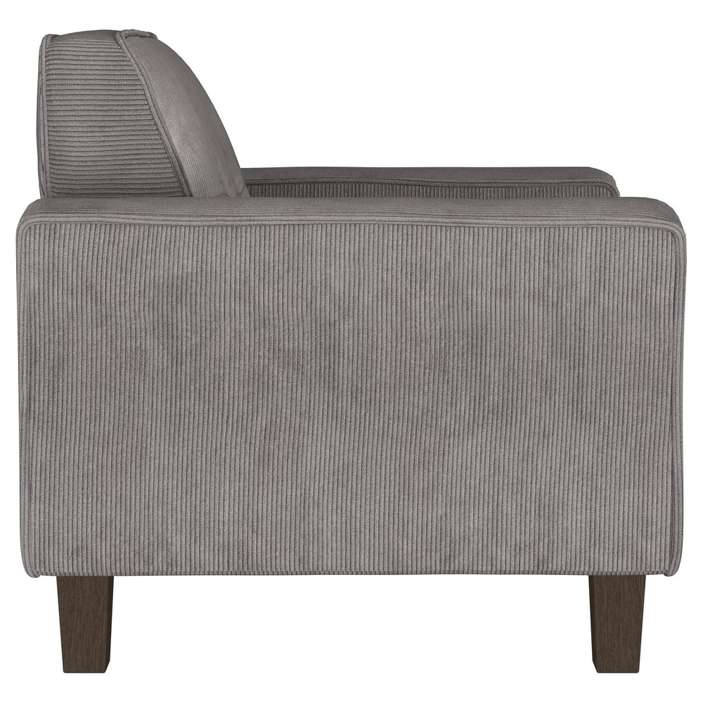 Sillón tapizado Deerhurst con brazos articulados y capitoné, color carbón