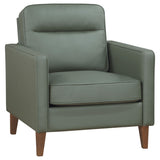 Sillón tapizado Jonah con brazos de riel, color verde