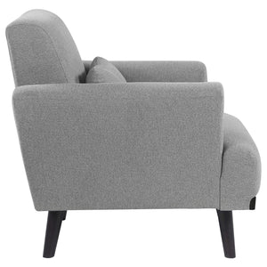 Sillón tapizado Blake con brazos articulados, color gris piel de tiburón