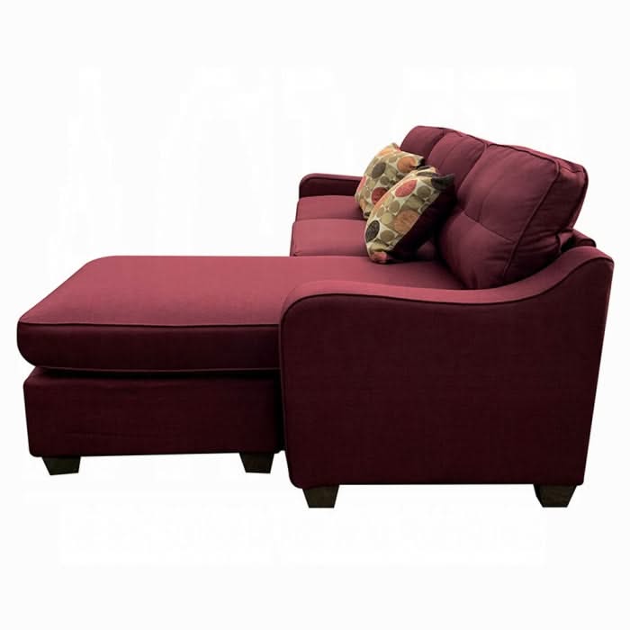 Sofá seccional reversible Cleavon II y otomana con 2 almohadas