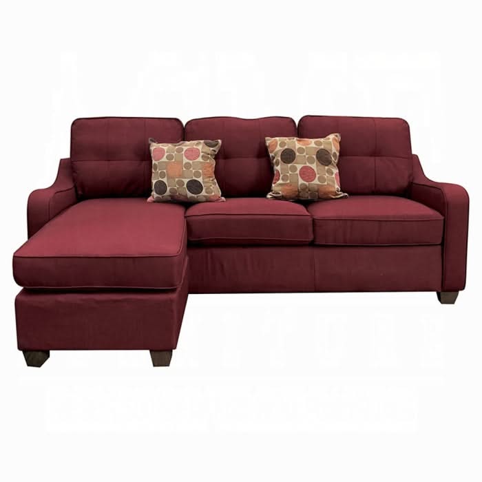 Sofá seccional reversible Cleavon II y otomana con 2 almohadas