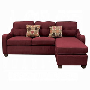 Sofá seccional reversible Cleavon II y otomana con 2 almohadas