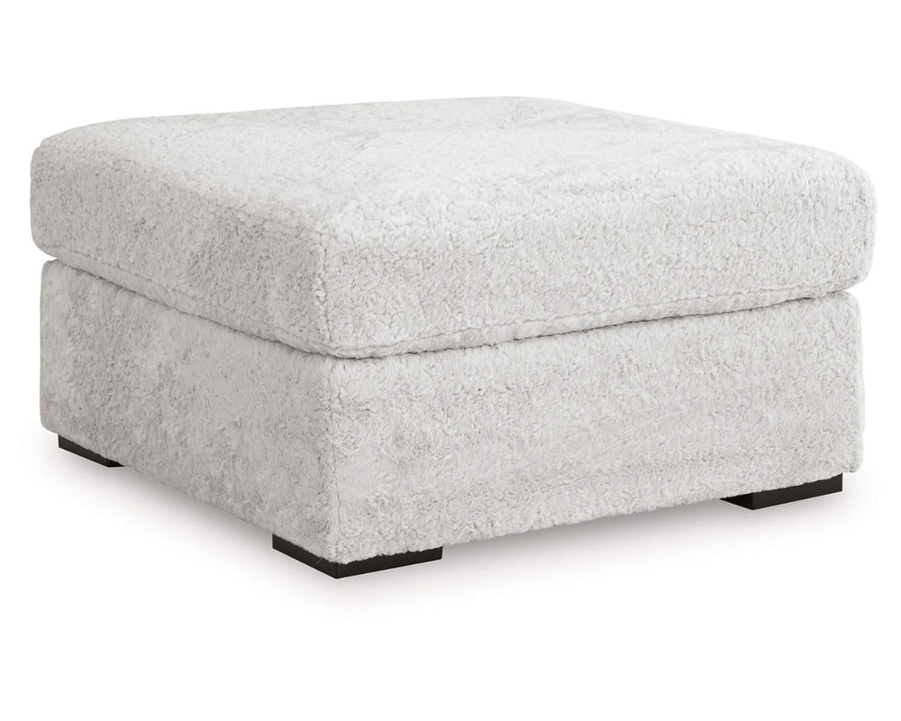 Otomana extragrande con acento de peluche