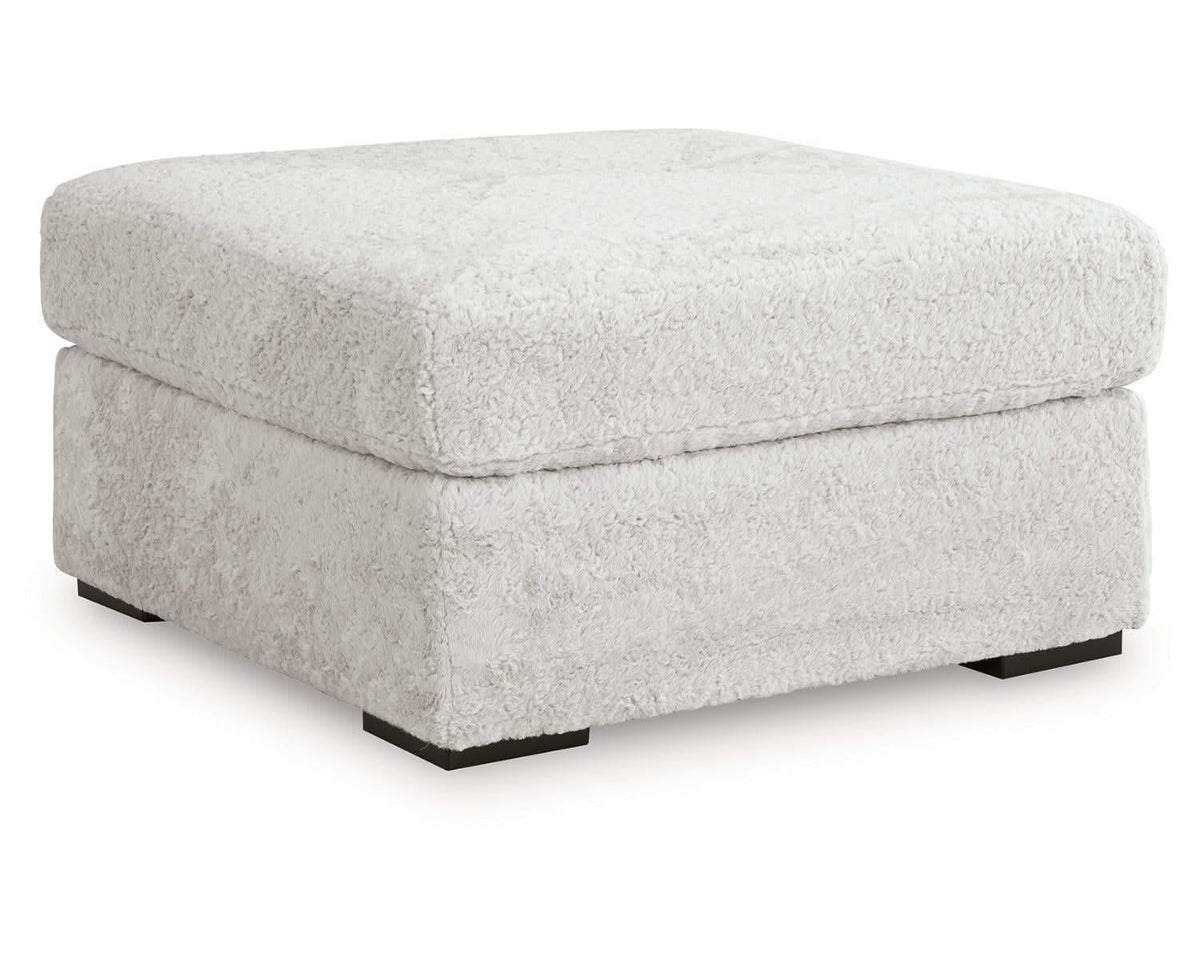 Otomana extragrande con acento de peluche