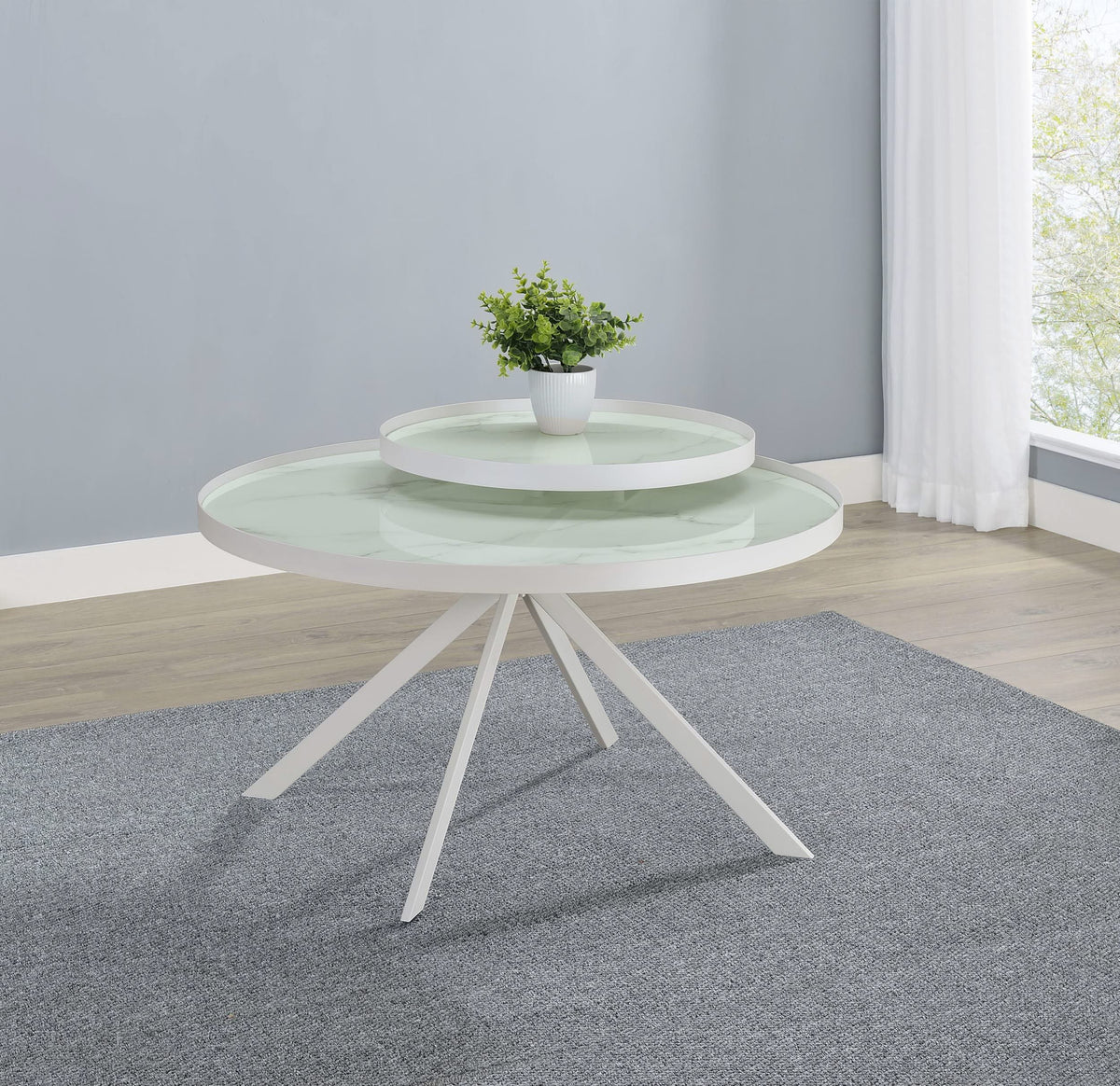 Mesa de centro Briggs redonda con tapa de cristal con estampado de mármol blanco