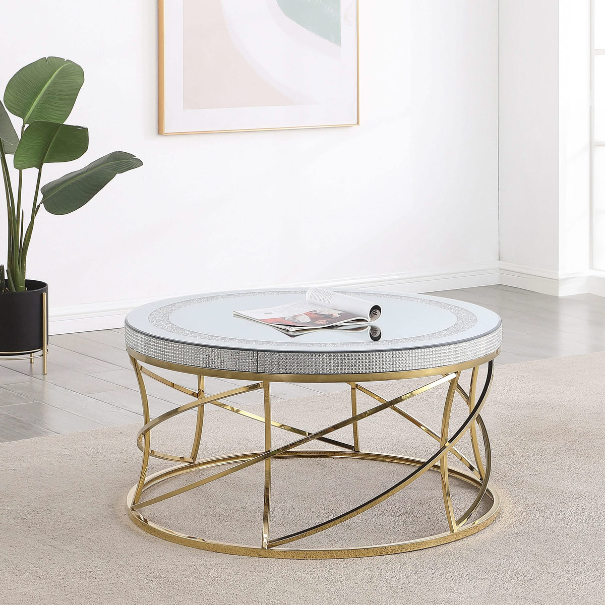 Mesa de centro Elise de acero inoxidable con superficie de espejo redonda, color dorado