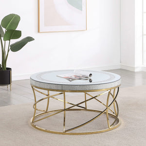 Mesa de centro Elise de acero inoxidable con superficie de espejo redonda, color dorado