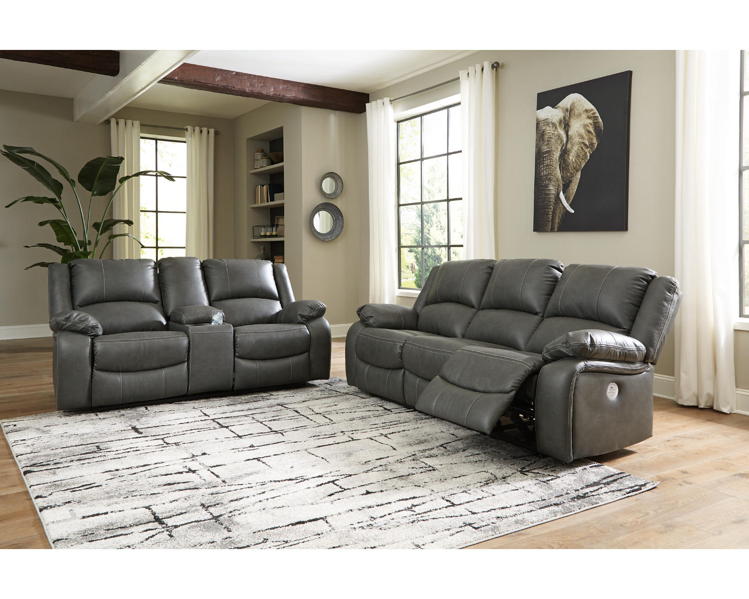 Calderwell Power Reclining Sofa and Manual Reclining Loveseat