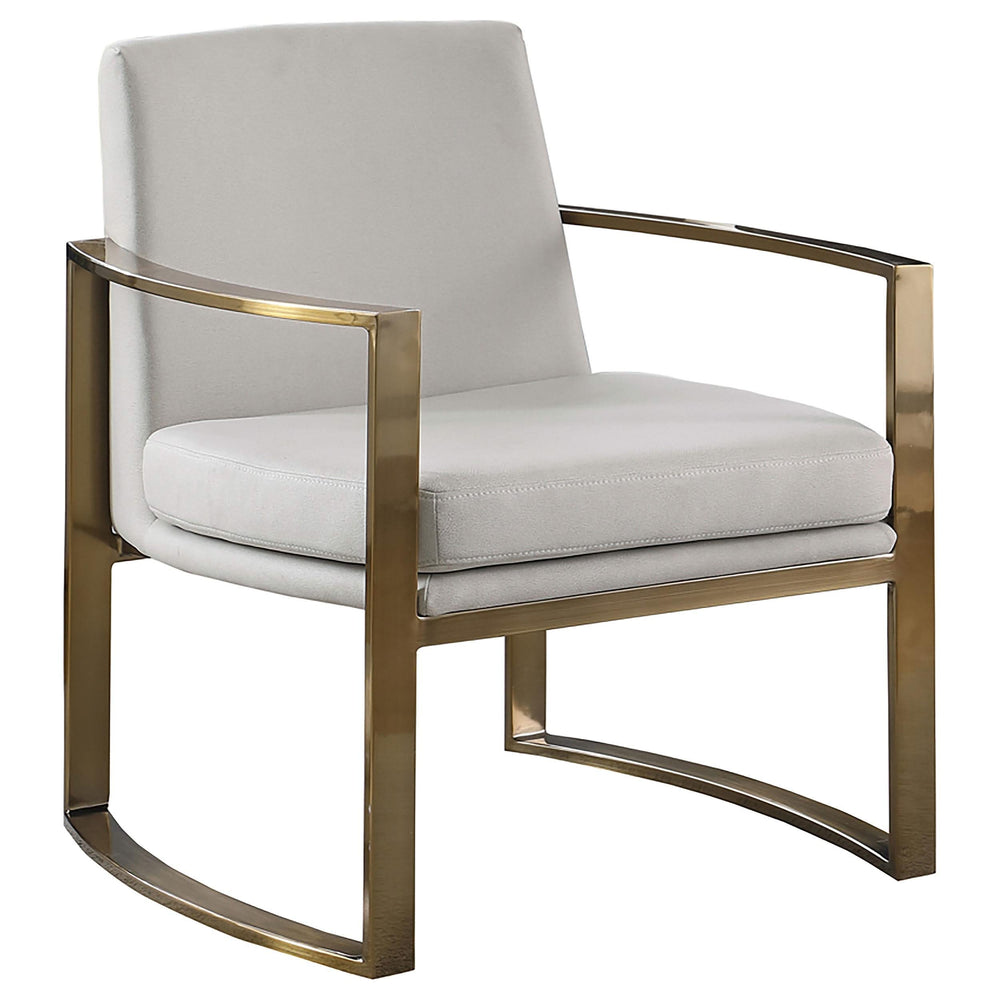 Sillón Cory tapizado con brazos arqueados, color crema