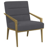 Sillón Kirra tapizado con brazos de metal, color gris oscuro