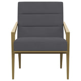 Sillón Kirra tapizado con brazos de metal, color gris oscuro