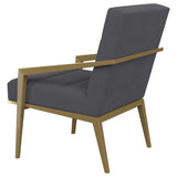 Sillón Kirra tapizado con brazos de metal, color gris oscuro