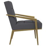 Sillón Kirra tapizado con brazos de metal, color gris oscuro
