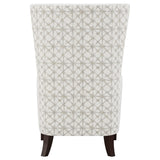 Sillón alto tapizado Pippin con respaldo alto y acento color Latte