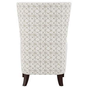 Sillón alto tapizado Pippin con respaldo alto y acento color Latte
