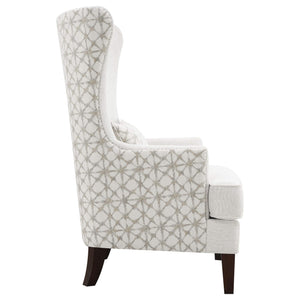 Sillón alto tapizado Pippin con respaldo alto y acento color Latte
