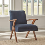 Sillón Cheryl con brazos de madera tapizados, color azul oscuro