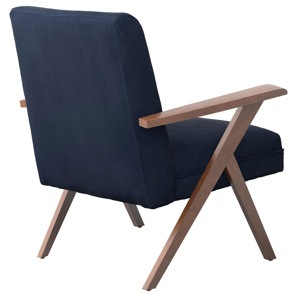 Sillón Cheryl con brazos de madera tapizados, color azul oscuro