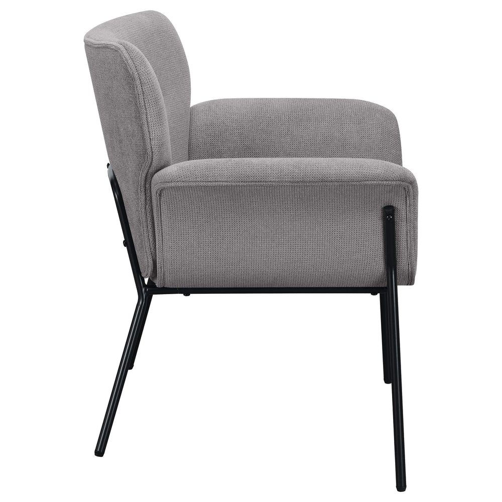 Sillón Davina tapizado con brazos acampanados, color gris ceniza