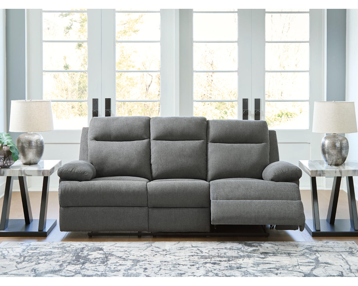 Side-Swipe Reclining Sofa with Drop Down Table