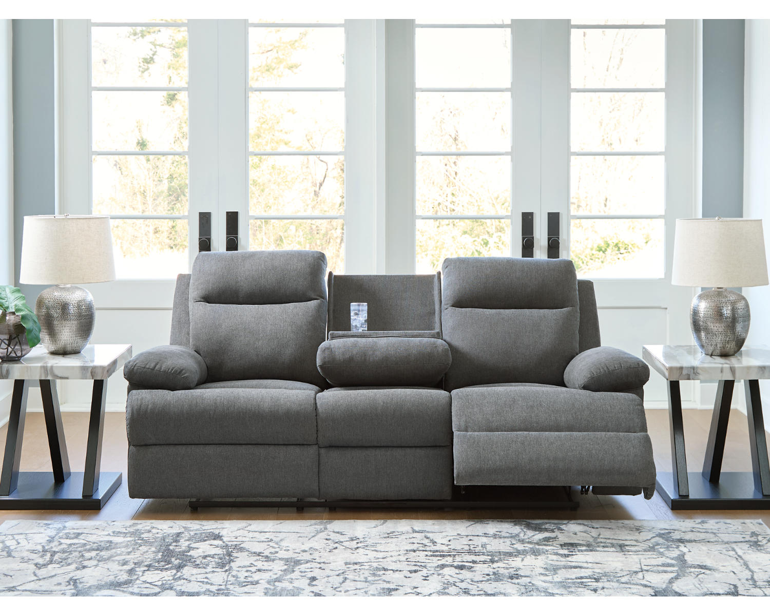 Side-Swipe Reclining Sofa with Drop Down Table