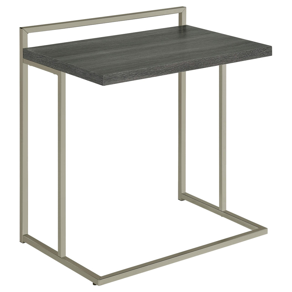 Mesa auxiliar rectangular Dani en forma de C, color gris desgastado