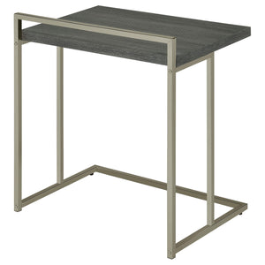 Mesa auxiliar rectangular Dani en forma de C, color gris desgastado