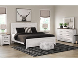 Gerridan King Panel Bed with Mirrored Dresser and Nightstand