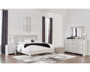 Zyniden King Upholstered Panel Bed, Dresser, Mirror and Nightstand