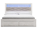 Altyra King Upholstered Bookcase Bed with Storage