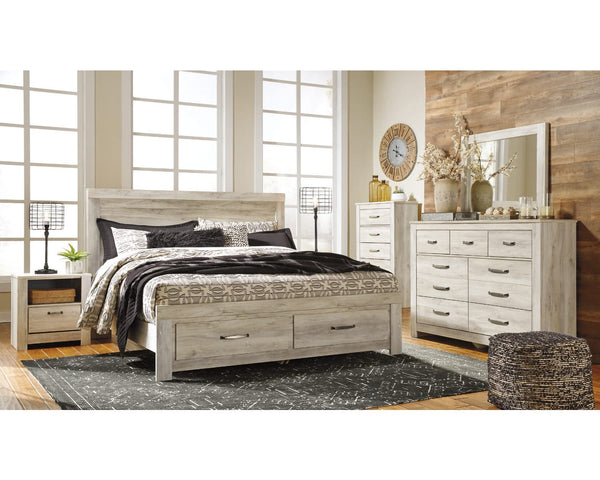 Cama Bellaby King con almacenaje, tocador, espejo, cómoda y dos mesitas de noche