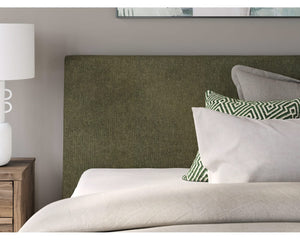 Cama Queen tapizada Chirason con listones enrollables
