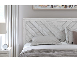 Cama King con paneles Cayboni