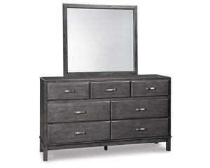 Cama Queen Caitbrook con almacenaje, tocador, espejo, cómoda y dos mesitas de noche