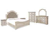 Cama tapizada Realyn King con paneles, tocador, espejo, cómoda y dos mesitas de noche