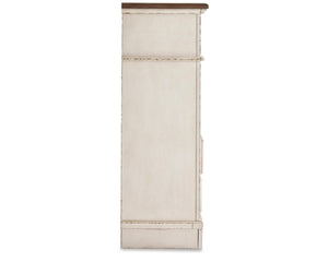 Cama tapizada Realyn King con paneles, tocador, espejo, cómoda y dos mesitas de noche