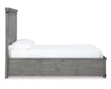 Cama Queen Russelyn con paneles de almacenaje, tocador, espejo, cómoda y dos mesitas de noche