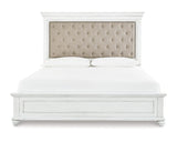 Cama King tapizada con paneles Kanwyn, tocador, espejo y cómoda