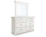 Kanwyn Queen Upholstered Panel Bed, Dresser, Mirror, and Nightstand